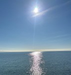 Sun and lake reflection