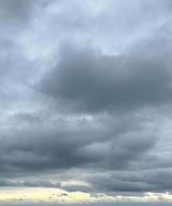 clouded sky, with light at the horizon